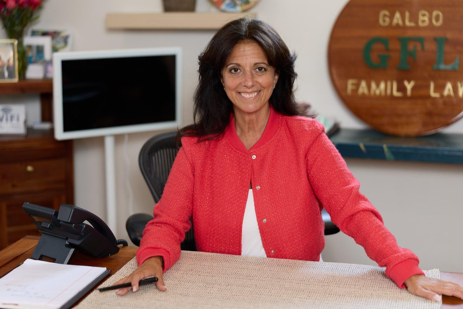 Attorney Tara J. Galbo at her desk in the Galbo Family Law office in Milford, Connecticut